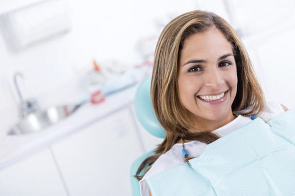 Smiling woman in dental chair